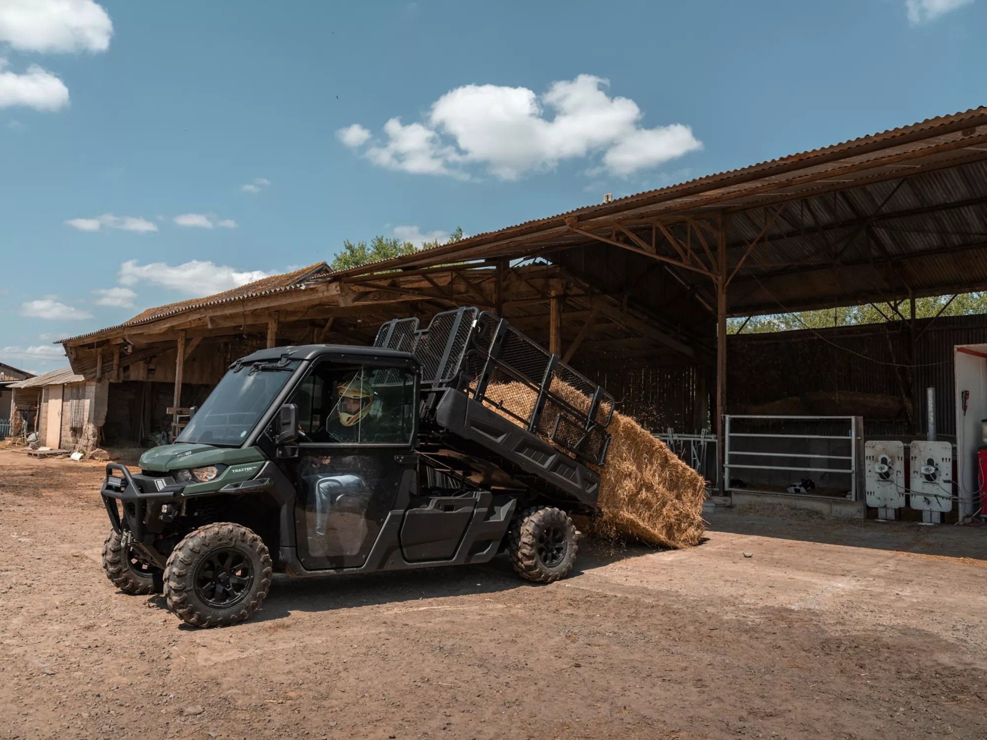 2026 Can-Am traxter HD11 parked on a ranch