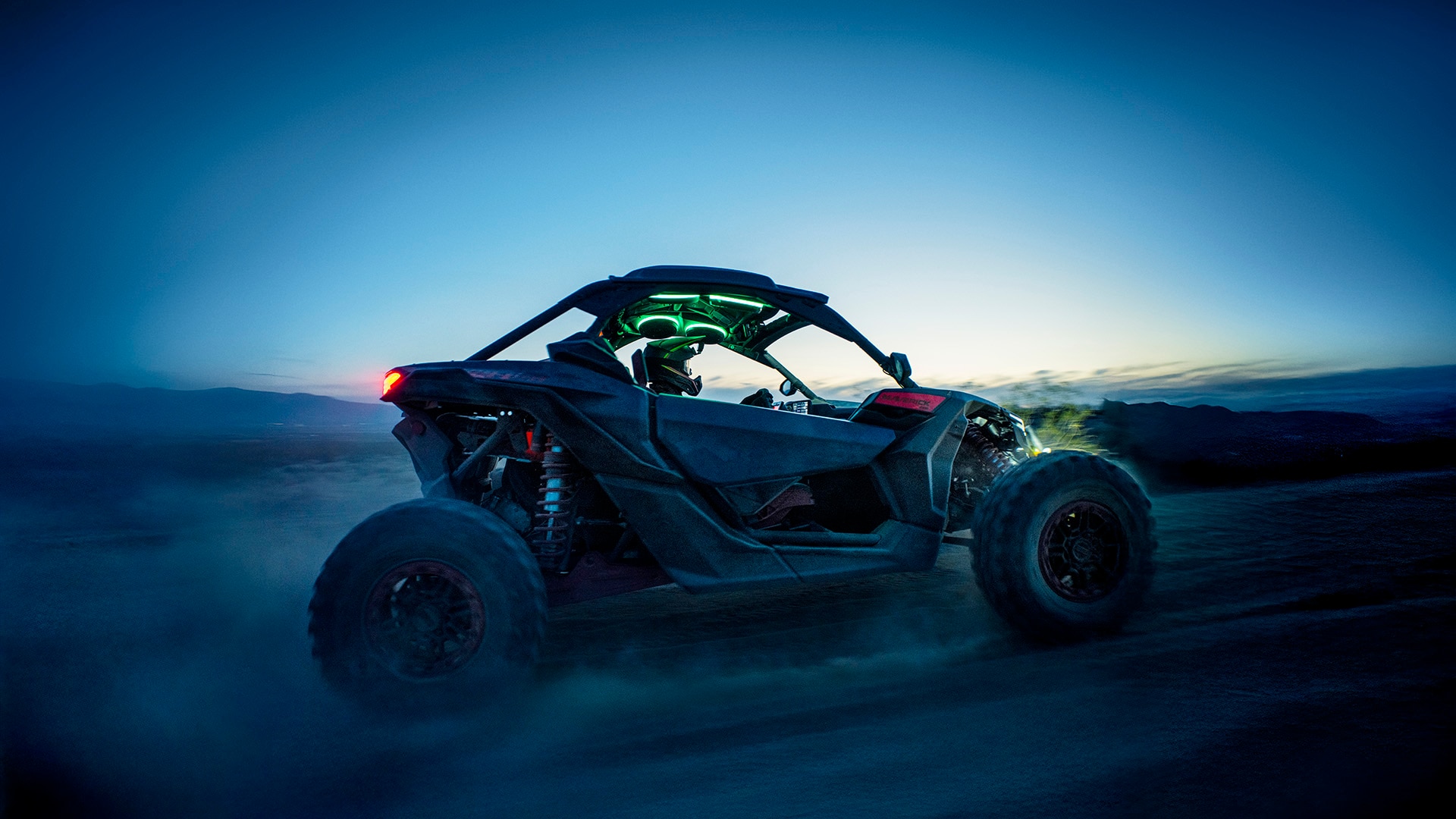 Can-Am Maverick X3 R RS driving under the setting sun