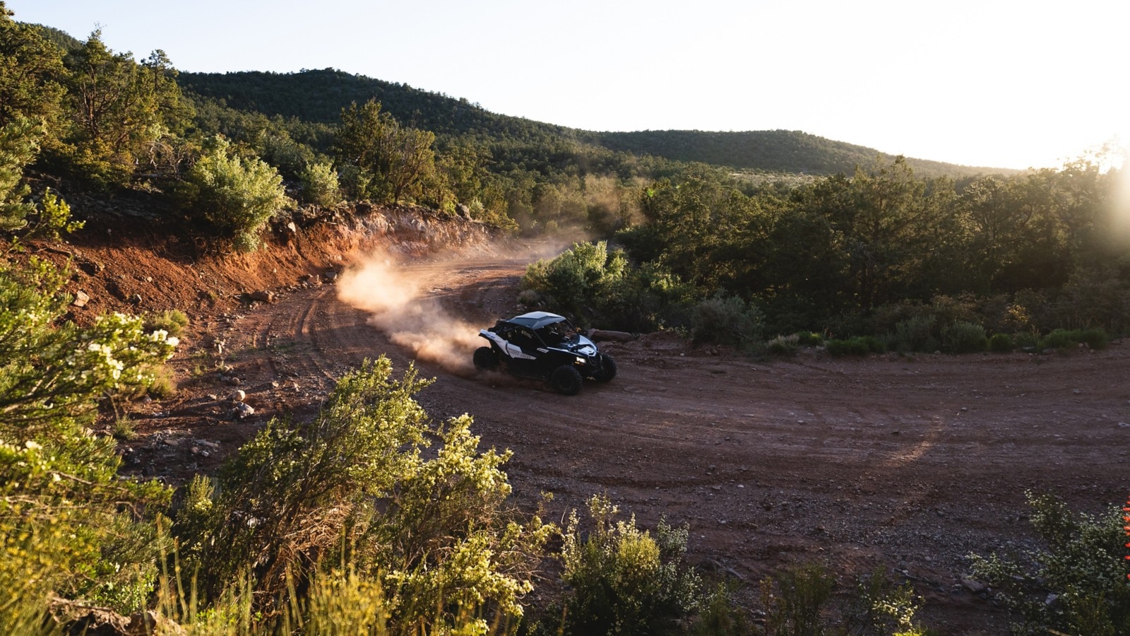 Can-Am Maverick X3 on a dusty curve