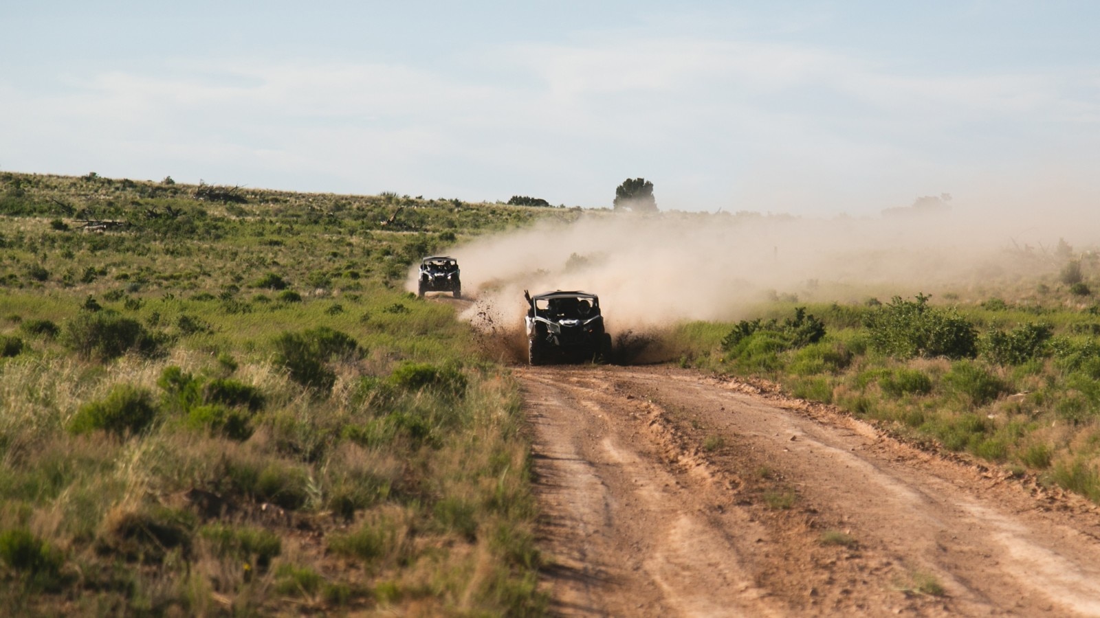 2 Can-Am Maverick X3's on dusty trail