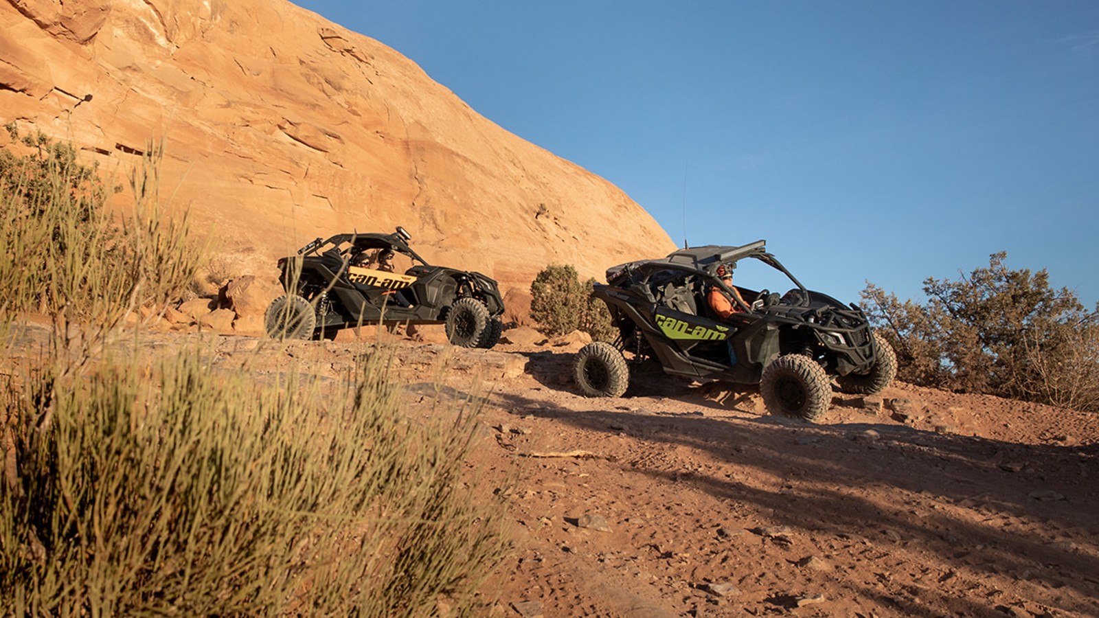 2 Can-Am Maverick X3's stopped in desert