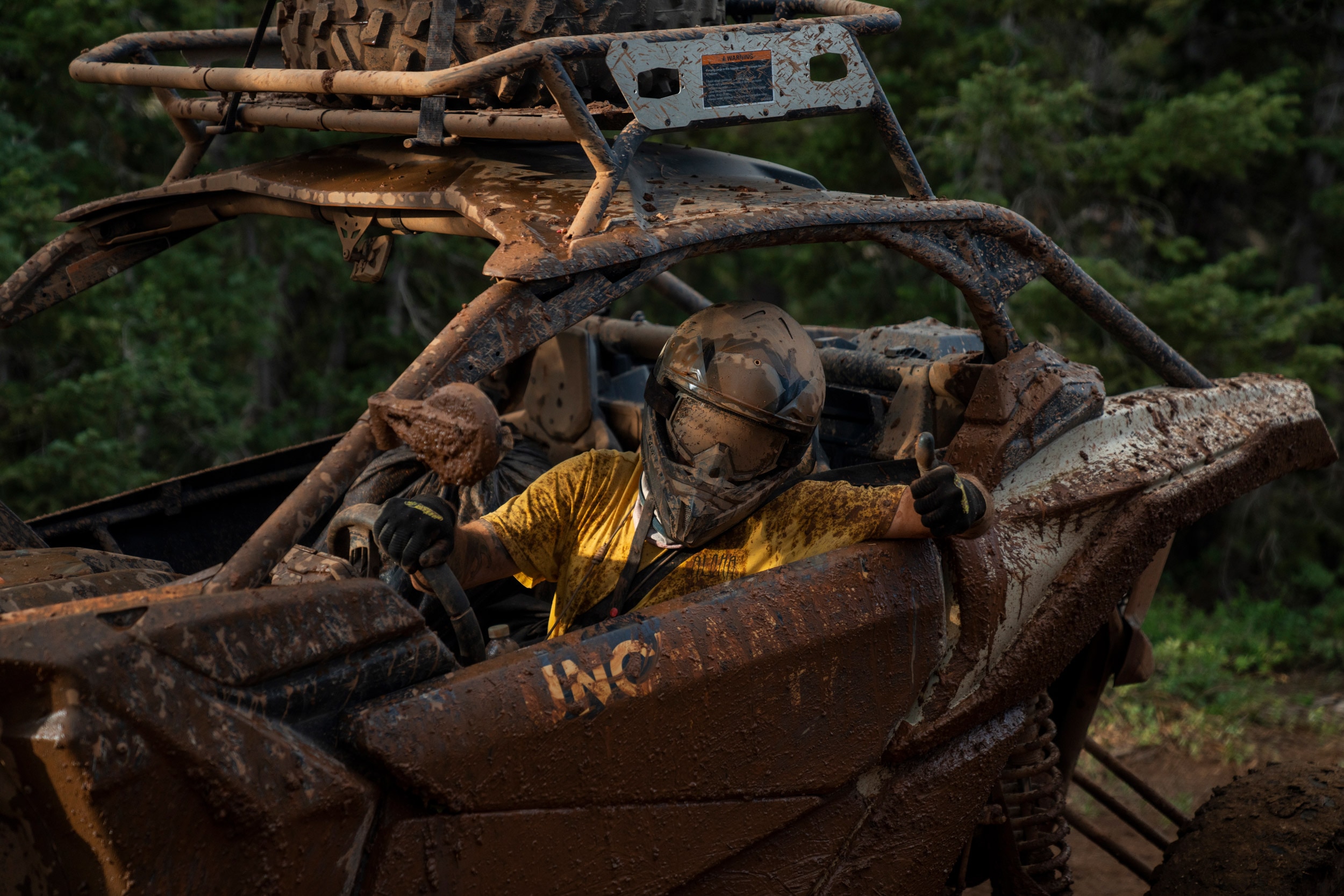 Man in a Can-Am Vehicle doing a thumbs up